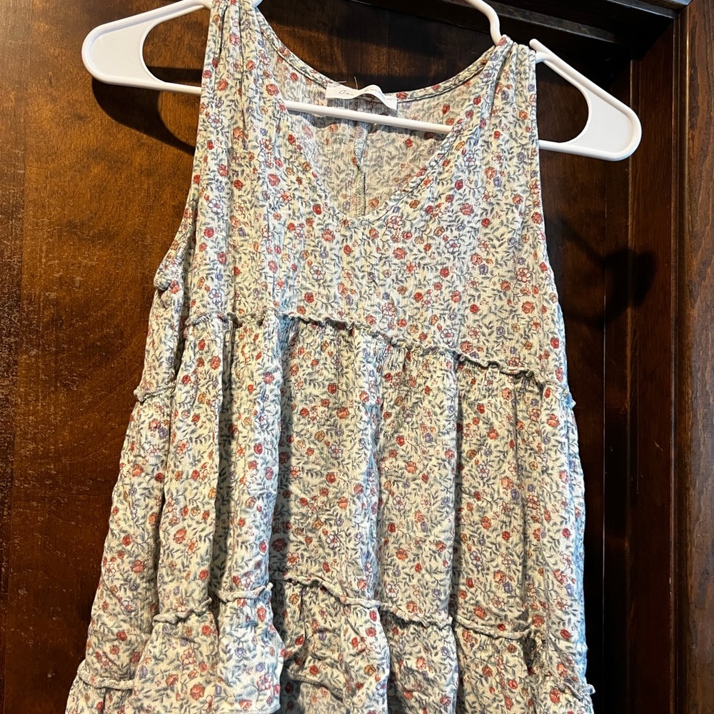 Size small. Floral slight crop High low tank. Ces Femme brand.